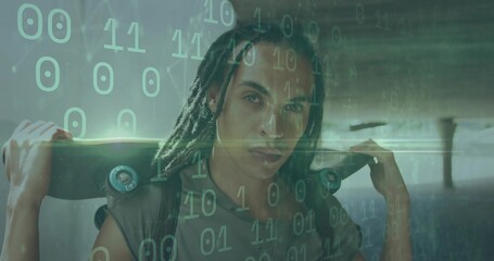 Holding skateboard, teen male standing beneath concrete overpass, with digital binary overlay