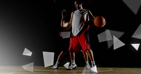 Dribbling athlete wearing jersey, shorts and shoes on gym floor, with ball and abstract lights