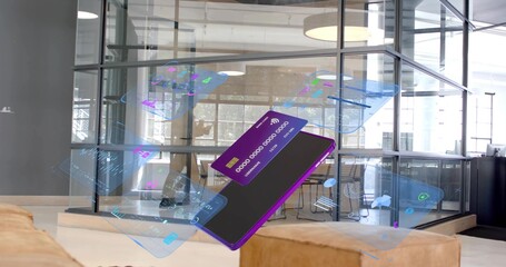 Floating purple device displaying holographic credit card UI panels in office lounge, with ottomans