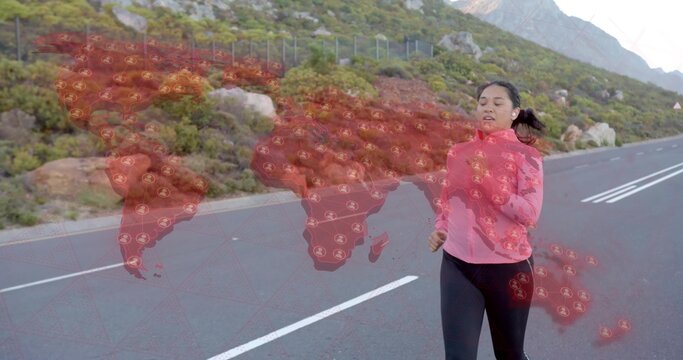 Jogging Asian woman in sportswear along paved mountain road with fence, map overlay, copy space - Powered by Adobe