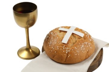 A brass chalice with red wine sits beside a round loaf of bread adorned with a white cross, representing Christian communion or Eucharist elements. background removed