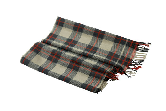 A cozy folded plaid scarf in cream, dark grey, and red tartan pattern, featuring fringed ends, on a transparent background. background removed