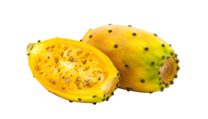 A cut open, spiky, yellow fruit revealing juicy interior and seeds on black
