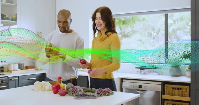 Man picking ginger and adding into honey jar, woman dipping apple slice home cooking tasting flavor