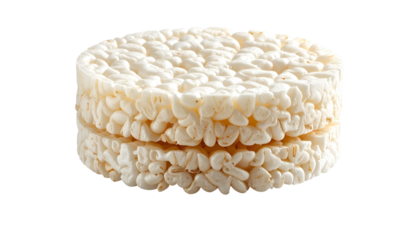Two circular, puffed rice cakes stacked, light beige, isolated on black