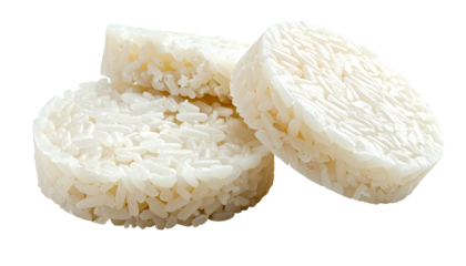 Three rounded, cooked rice cakes stacked, showcasing texture and detail on a black background