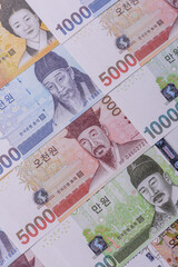 Korean paper money, won, and cash banknotes for financial transactions. Korean money
