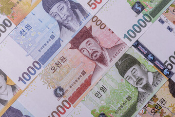 Korean paper money, won, and cash banknotes for financial transactions. Korean money
