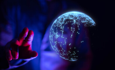 Abstract image of a hand interacting with a glowing digital sphere, representing connectivity and the digital world.