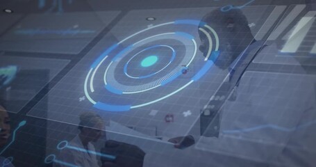 Three doctors swiping tablet driving hologram appearing above table guiding collaborative review - Powered by Adobe