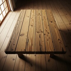 High-angle view of a rustic wooden table with visible wood grain and natural tones, set on a matching wooden floor.