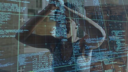 Woman initiating health routine in loft stretching up as data grid floating pausing in prayer pose - Powered by Adobe