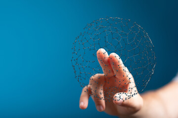 Hand reaching towards network sphere. Concept of connectivity, communication, technology, global...