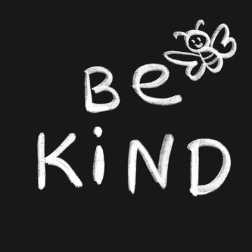Be kind writing and a bee drawing, chalk on blackboard, inspirational text