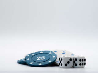 Dice and poker chips on white backgroud