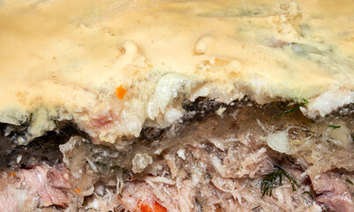 Russian homemade meat jelly.Hearty cold jelly.Meat aspic.Meat base in jelly.Meat snack in the form of jelly.