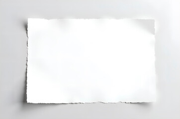 Torn white paper on a neutral background with ample copy space.
