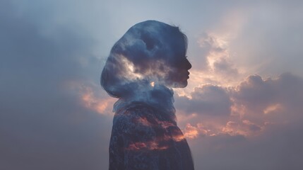 Silhouette of Woman with Clouds Symbolizing Dreams and Reflection