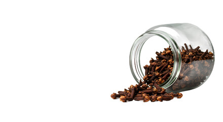 Dried Whole Cloves Spilling from a Glass Jar on a Dark Background