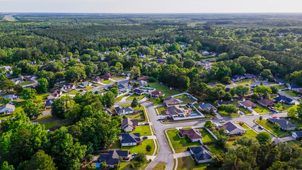 Fototapeta premium Aerial landscape of Richmond Hill residential area sunny summer day in Bryan County Georgia