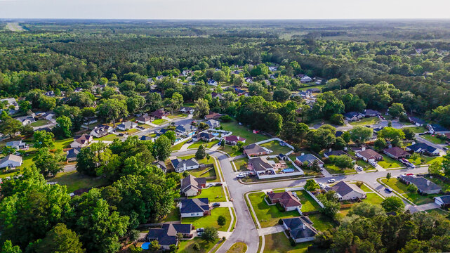 Aerial landscape of Richmond Hill residential area sunny summer day in Bryan County Georgia
