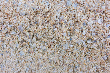 Fine sand texture with small stones, natural background