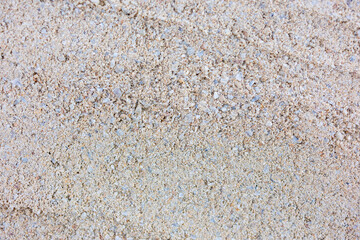 Fine sand texture with small stones, natural background