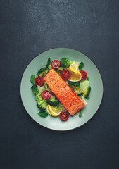 grilled salmon fillet, with vegetables, broccoli, cherry, iceberg lettuce, spices and herbs, homemade, no people,