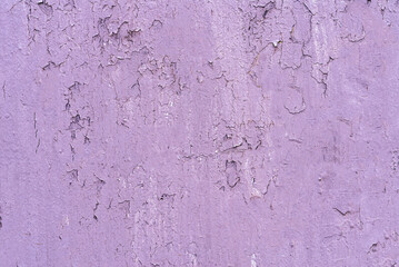 A solid colored background with a distinct, uneven texture