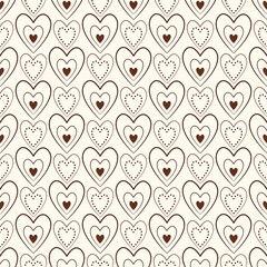 Sweet understated background. Seamless pattern of small brown hearts. Lots of tiny brown hearts on delicate beige background. A romantic delicate holiday decor