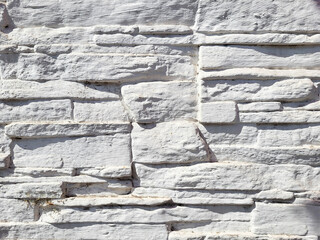 Seamless texture of white decorative slate stone with an abstract background surface texture