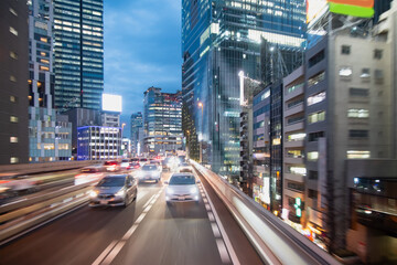 Obraz premium A night traffic jam on the city highway in Tokyo, Japan