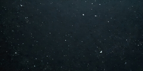 Obraz premium Deep space dark textured background with numerous small white flecks