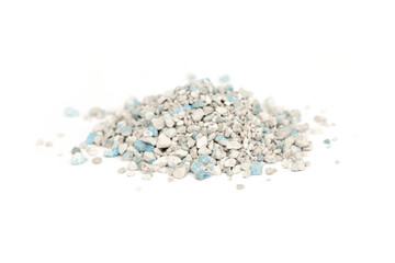 Cat litter filler composed of small granules in various shades, showcasing a blend of textures and colors, ideal for maintaining cleanliness in pet environments