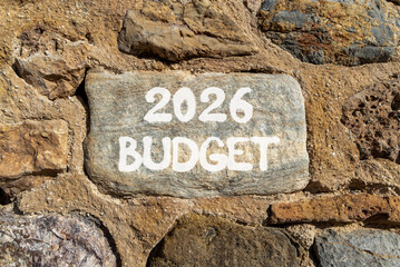 2026 Budget symbol. Concept words 2026 Budget on beautiful grey stone on stone wall. Beautiful stone wall background. Business and 2026 budget concept. Copy space.