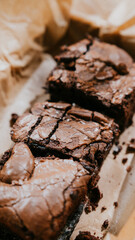 A box of brownies with a brown paper wrapper