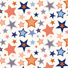 Obraz premium A seamless pattern with stylized scattered stars in various colors and designs. A festive abstract texture for decorative gift wrapping or textiles.
