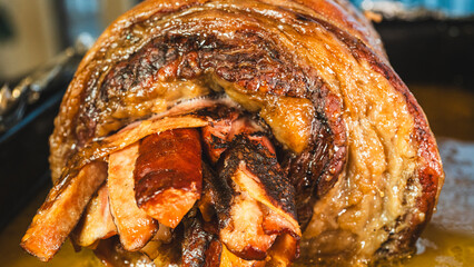 Juicy stuffed beef ribs with calabrese sausage, bacon and vegetables. Golden brown and perfectly cooked, tied with twine. Ideal for gourmet menus and meat promotions.