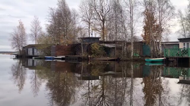boathouses on the lake shore, autumn landscape