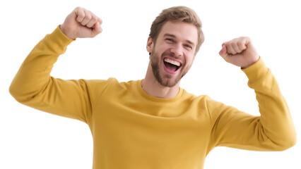 A man in a yellow sweater shows a joyful expression with raised fists, conveying a sense of triumph and excitement.