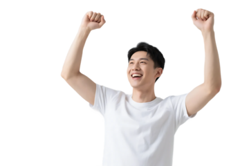 A young man with a bright smile is raising his arms, showing an excited and joyful expression.
