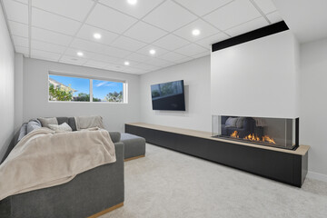 Living room with a fireplace and a flat screen TV