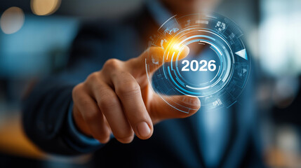 Business professional's hands selecting year 2026 on virtual interface face not visible future planning dashboard strategic goals digital transformation icons innovation graph