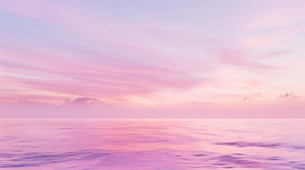 Pink Sunset Sky Over Calm Ocean Water with Soft Clouds and Gentle Waves
