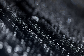 water drops on glass in close-up. abstract dark background with beautiful bokeh. Mockup for your...