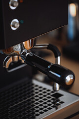 Modern coffee machine brews espresso in stylish home kitchen setting