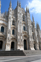 Fototapeta premium Views of central part of Milan, Brera district, shopping area, church Duomo, architectural details, streets, walking in Milan, Lombardy, Italy