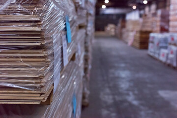 Wood industry warehouse with packaged laminate boards