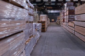 Wood industry warehouse with packaged laminate boards