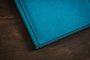 Captivating turquoise journal resting on a rustic wooden table invites creativity and inspiring thoughts at any time of the day